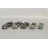 Four James Bond Aston Martin 1:18 scale models, RC2 DBS, Masito DB7 Vantage, Auto Art DB5,