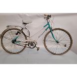 A Universal Riviera Sport ladies bicycle, in green and white 186 cm wide