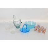 A collection of glassware, including coloured fruit bowls, tumblers, blown glass water jug, etc