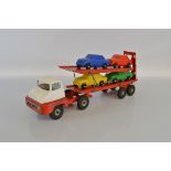 An unboxed Tri-ang TM5305 Pressed Steel Thames Trader Articulated Car Transporter, very hard to find