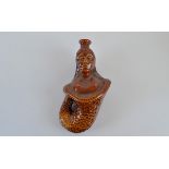 A Ridgway treacle glazed figural gin flask, in the form of a mermaid, 18.5cm high