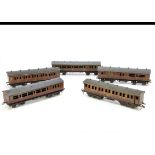 Vintage Bing and Bassett-Lowke 0 Gauge LMS crimson Bogie Coaches, all in lithographed crimson,