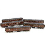 A fine rake of 0 Gauge LMS Corridor Coaches by Bond's o' Euston Road for restoration, five heavily-