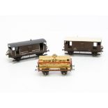 An uncommon Leeds Model Co 0 Gauge BP tank wagon and 2 brake vans, the tanker in buff with red