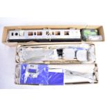 Three part-made and unmade 0 Gauge Coach Kits by Westdale and others, a mostly-completed but