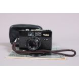 A Rollei B35 Compact Camera, black, made in Singapore, serial no 4603972, shutter working, meter