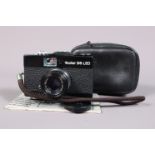 A Rollei 35 LED Compact Camera, black, made in Sigapore, serial no 7394741, shutter working, meter