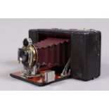 A Blair No 3 Combination Hawk-Eye Folding Camera, quarter plate format on roll film or glass plates,