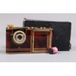 A Red and Gold Marbleised Kunik Petie Vanity Camera, a grey and gold coloured Petie camera housed in
