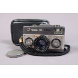 A Rollei 35 Classic Titanium Compact Camera, made in Germany, serial no 8101240, shutter working,