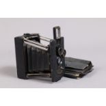 A Contessa Duchessa Strut Folding Plate Camera, for 6 x 4.5cm plates, body G, shutter working, f/8