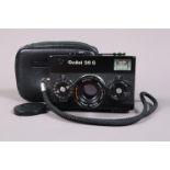 A Rollei 35 S Compact Camera, black, made in Singapore, shutter working, meter responsive, body G-