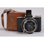 A Nagel Pupille Roll Film Camera, serial no 87694, format 3 x 4cm on 127 film, body G, Compur