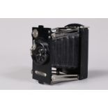 An ELC L'As (Ace) Strut Folding Plate Camera, serial no 539, circa 1912, 6 x 4.5cm plates, body F,