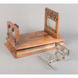 A mid-19th Century walnut-veneer Graphoscope, 400mm long, F, stereoscopic image holder detached;