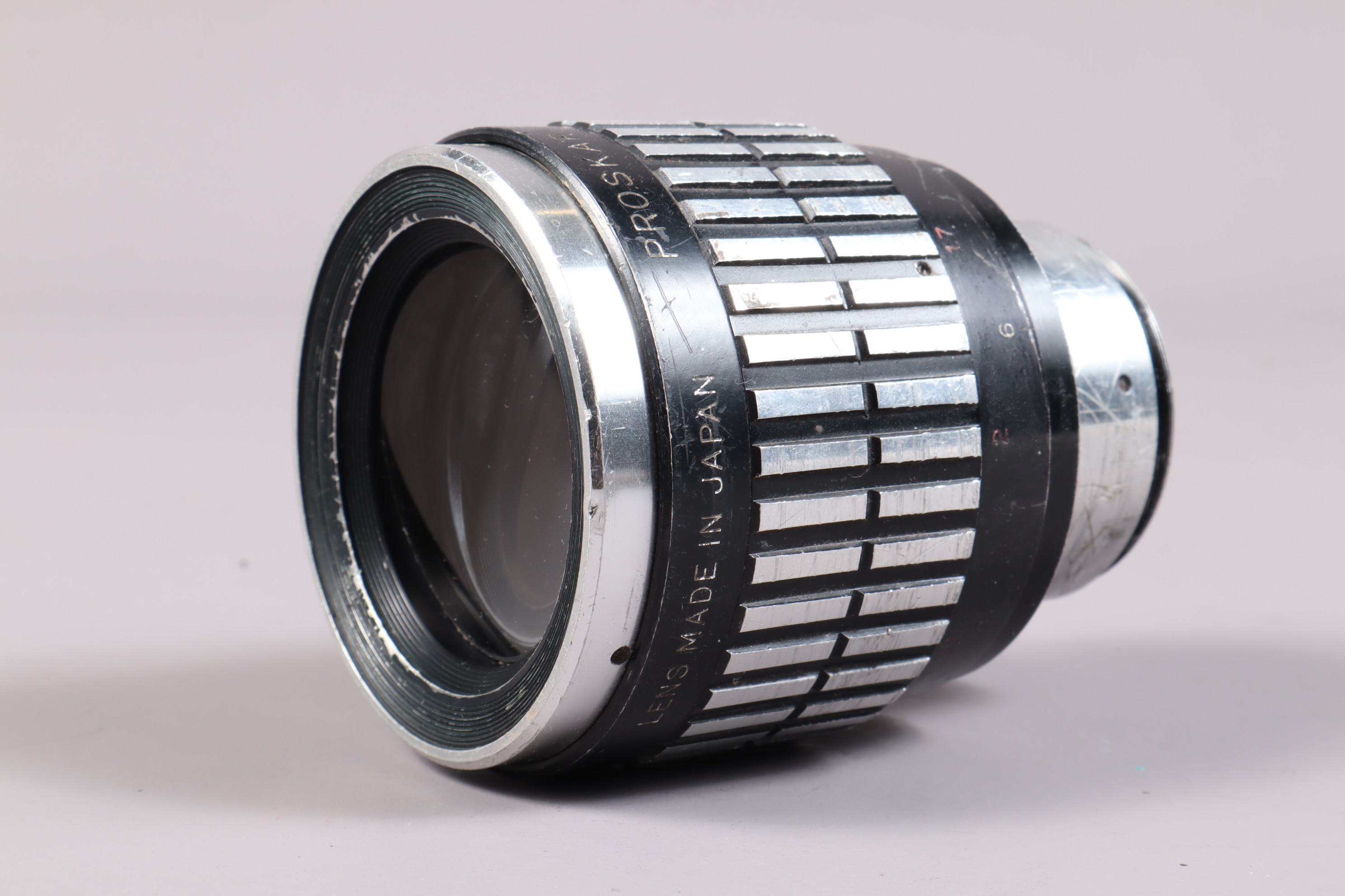 A Proskar-Ishico Anamorphic-16 Lens, 2x, serial no 810241, made in Japan, barrel P-F, heavy wear,