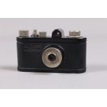 A Konrad Köhnlein Wiko Sub-Miniature Camera, 13 x 17mm format on 16mm roll film, bakelite body G,