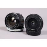 An Asahi Optical Fish-eye-Takumar 18mm f/11 Lens and a Super-Takumar 28mm Lens, M42 screw mount,