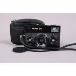 A Rollei 35 Compact Camera, black, made in Singapore, serial no 6154446, shutter working, meter