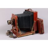 A Whole Plate Mahogany & Brass Field Camera, circa 1900, tapered chamfered-corner black bellows,