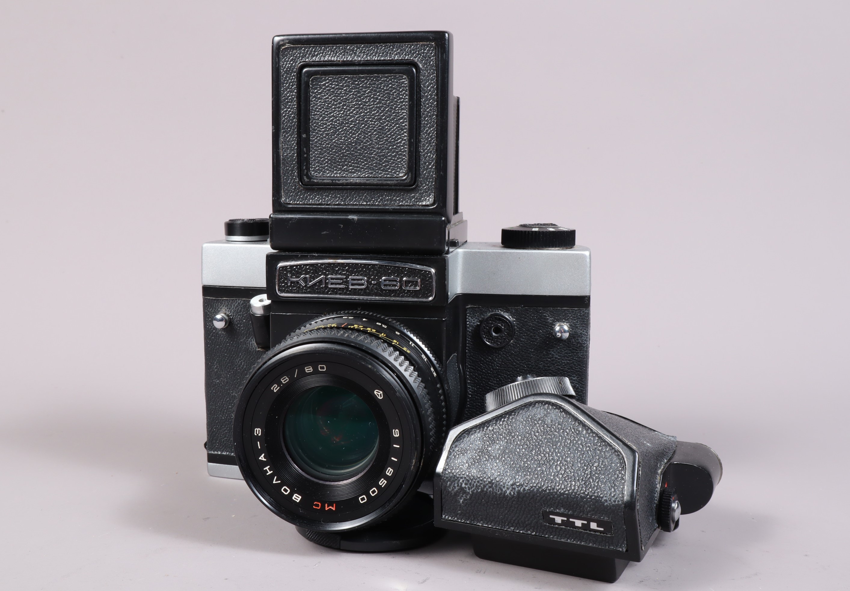 A Kiev 60 Camera, serial no9201220, shutter working, body G, some wear, with waist level finder, TTL