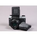 A Kiev 60 Camera, serial no9201220, shutter working, body G, some wear, with waist level finder, TTL