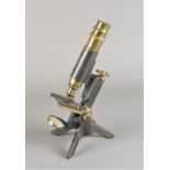 A late 19th Century lacquered and anodised brass Compound Monocular Microscope, with eyepiece,