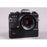 A Rolleiflex SL35 E SLR Camera, serila no 6376320, shutter working, meter responsive, body G-VG,