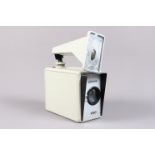 A Weinberger Robot Recording/Surveillance Camera, 24 x 24mm format on 35mm film, an industrial