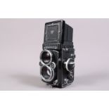 A Rolleiflex 2.8F TLR Camera, serial no 2955586, shutter working, meter functions, body G, some