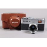 A Riken Ricoh 16 Subminiature Camera silver finish, 14 x 10mm on 16mm film, body VG, shutter
