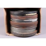 Seven Cans of 35mm Cine Films with Optical Sound, cans are 38cm diameter approx, various films wound