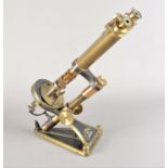 A 19th Century lacquered brass R & J Beck Popular Model Binocular Microscope, with pair of