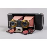 A Blair Stereo Weno Roll Film Camera, F-G, tripod socket area worn, shutter working, lenses F