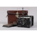 A Zeiss Ikon Bebe Strut Folding Plate Camera, 6.5 x 9cm, body F, unpleated bellows have a small rip,