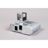 A Concava Tessina Automatic 35mm TLR Camera, chrome, serial no 61129, format 14 x 21mm, body G,