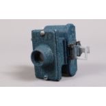 A Blue United Optical Merlin Subminiature Camera, 20 x 20mm on roll film, body G, shutter working,