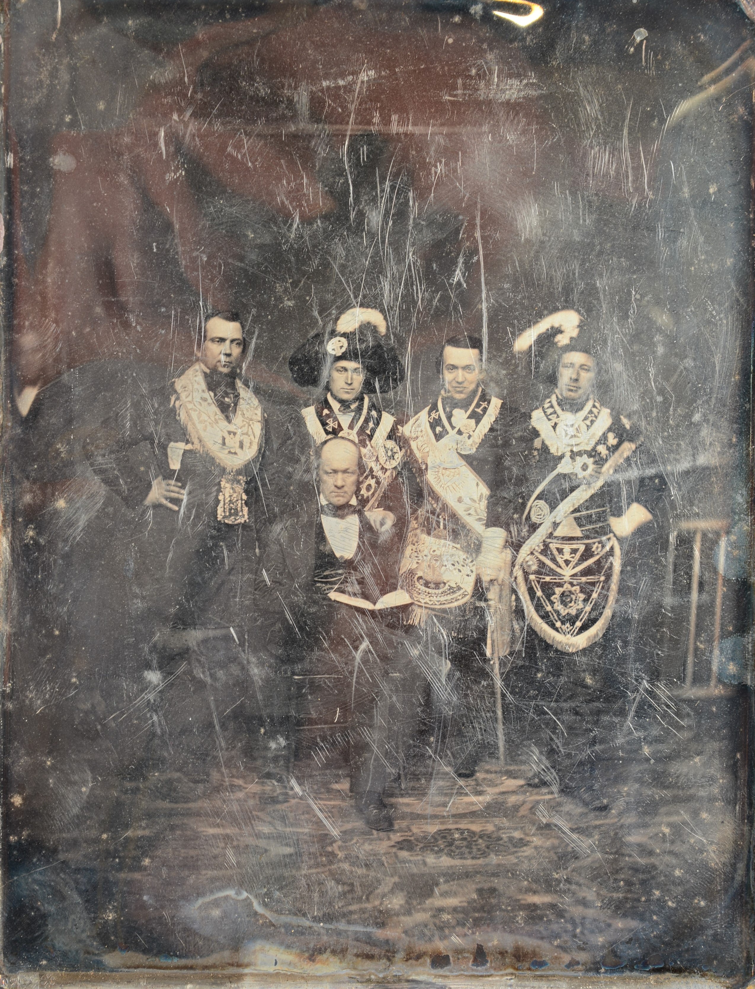 A Whole-Plate Daguerreotype of Four Freemasons or Odd Fellows In Full Regalia, with older seated and