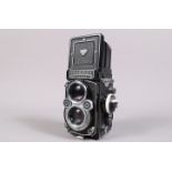 A Rolleiflex 3.5F TLR Camera, serial no 2217358, shutter working, meter responsive, body G, some