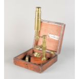 An early 19th Century lacquered brass Case-Mounted Compound Monocular Microscope, with eyepiece,