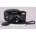 A Rollei 35 T Compact Camera, black, made in Singapore, serial no 6379567, shutter sticking open