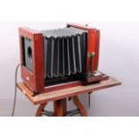 A Kodak Limited Whole Plate Tailboard Camera, lens and lens board missing, viewing screen present,