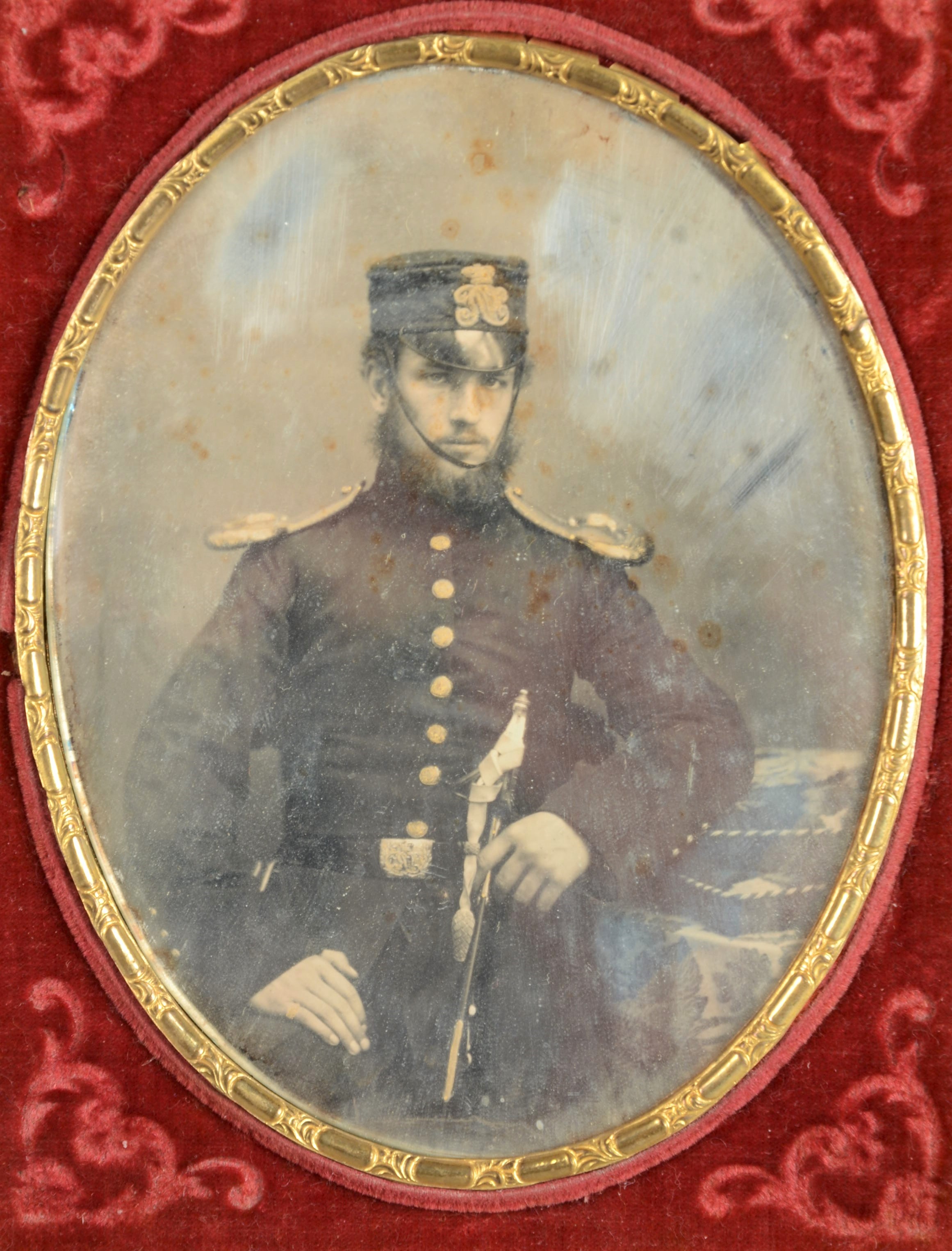 Cased Portrait Daguerreotypes of Gentlemen, oval quarter-plate - young bearded officer, sword in