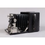 An Ensign Sanderson Regular Quarter Plate Field Camera, serial no 26223, circa 1930, body G-VG, wear