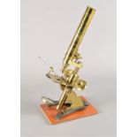 A 19th Century lacquered brass Compound Monocular Microscope, with eyepiece, rack and pinion