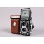 A Rolleiflex T TLR Camera, grey, with exposure meter, serial no T 2151127, shutter working, meter