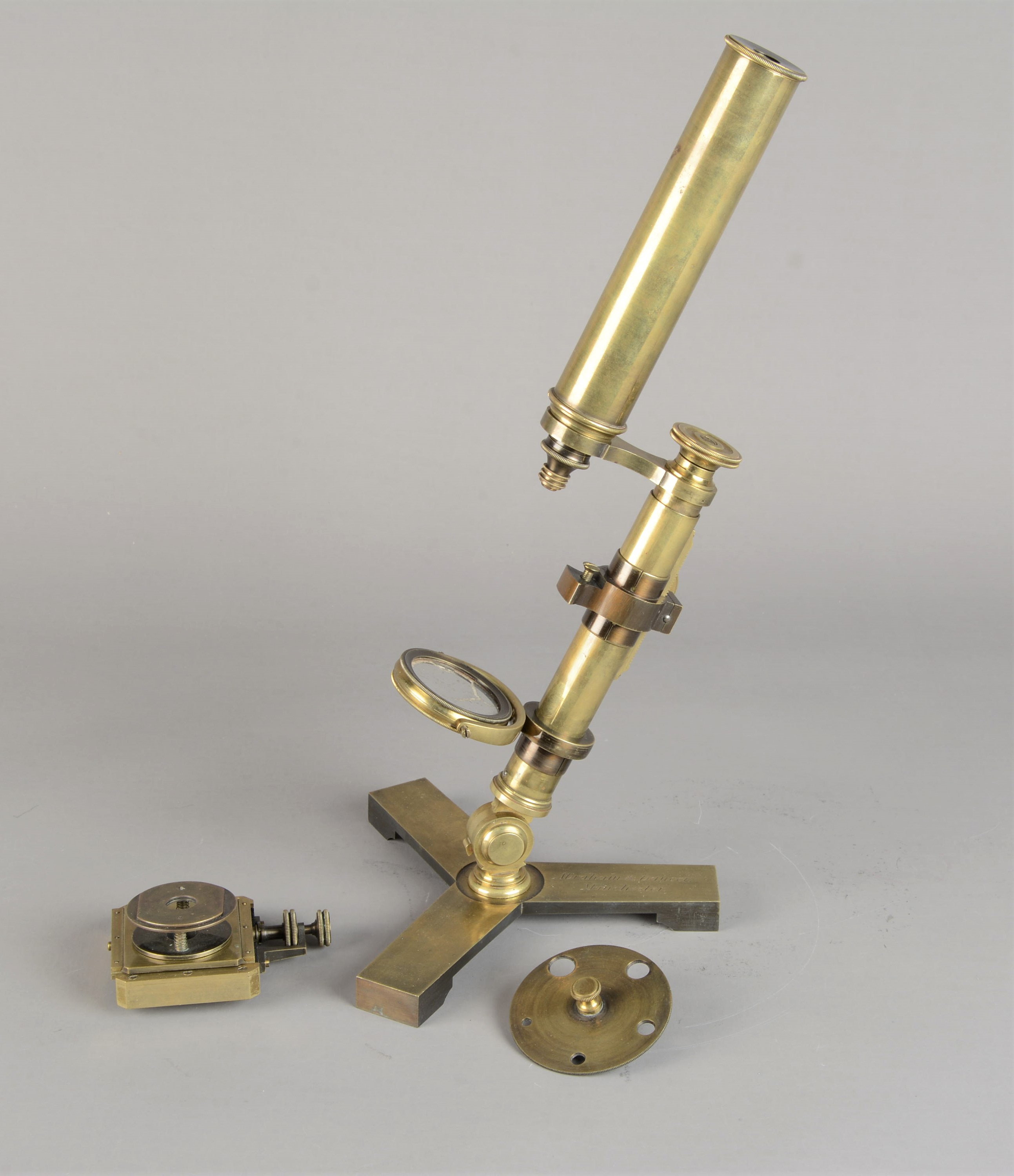 A mid-19th Century brass Abraham & Dancer Improved Compound Monocular Microscope, with eyepiece,