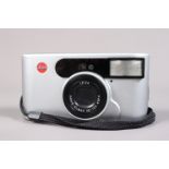 A Leica C1 Compact Camera, powers up, shutter working, flash working, otherwise untested, body F-