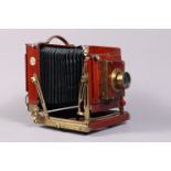 A Thornton Pickard Royal Ruby Half Plate Field Camera, chamfered cornered black bellows, triple