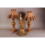A pair of mid 20th century carved wood and gilt lamp bases, with shades, 50cm, together with a